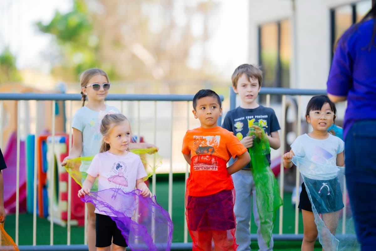 Montessori kids playing outside